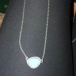 Lia Sophia blue stone lined with blue rhinestones.